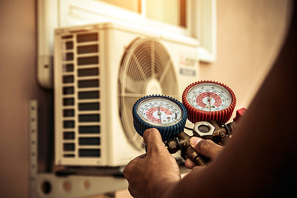 Professional Heat Pump Repair technician working in Ryland, AL